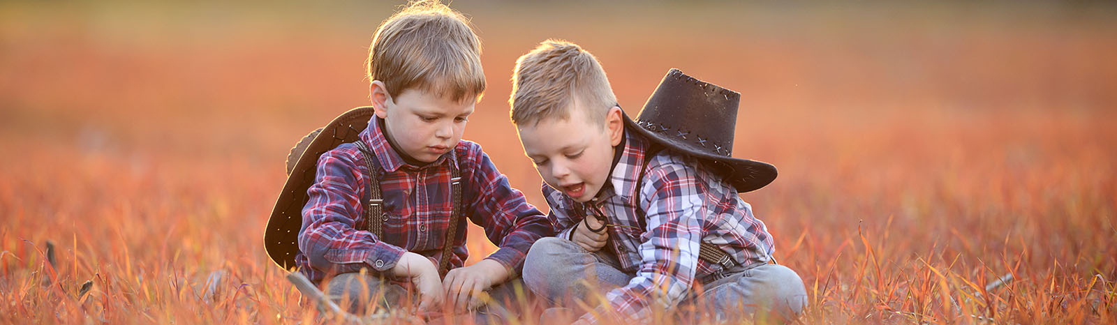 two boys in meadow