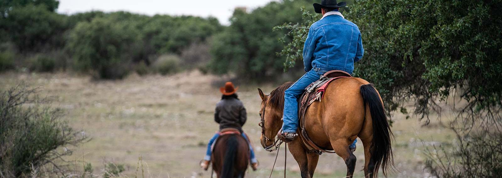 Two men on horses