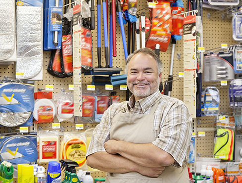 Hispanic man standing in hardware store
