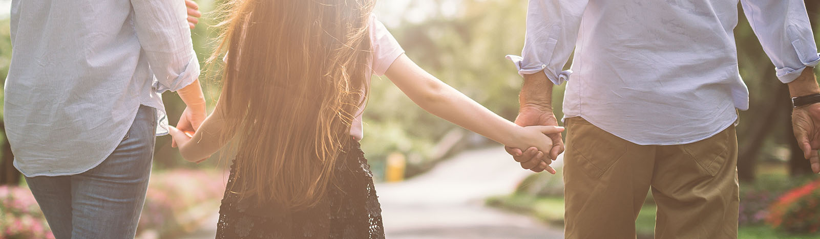 Family walking and holding hands